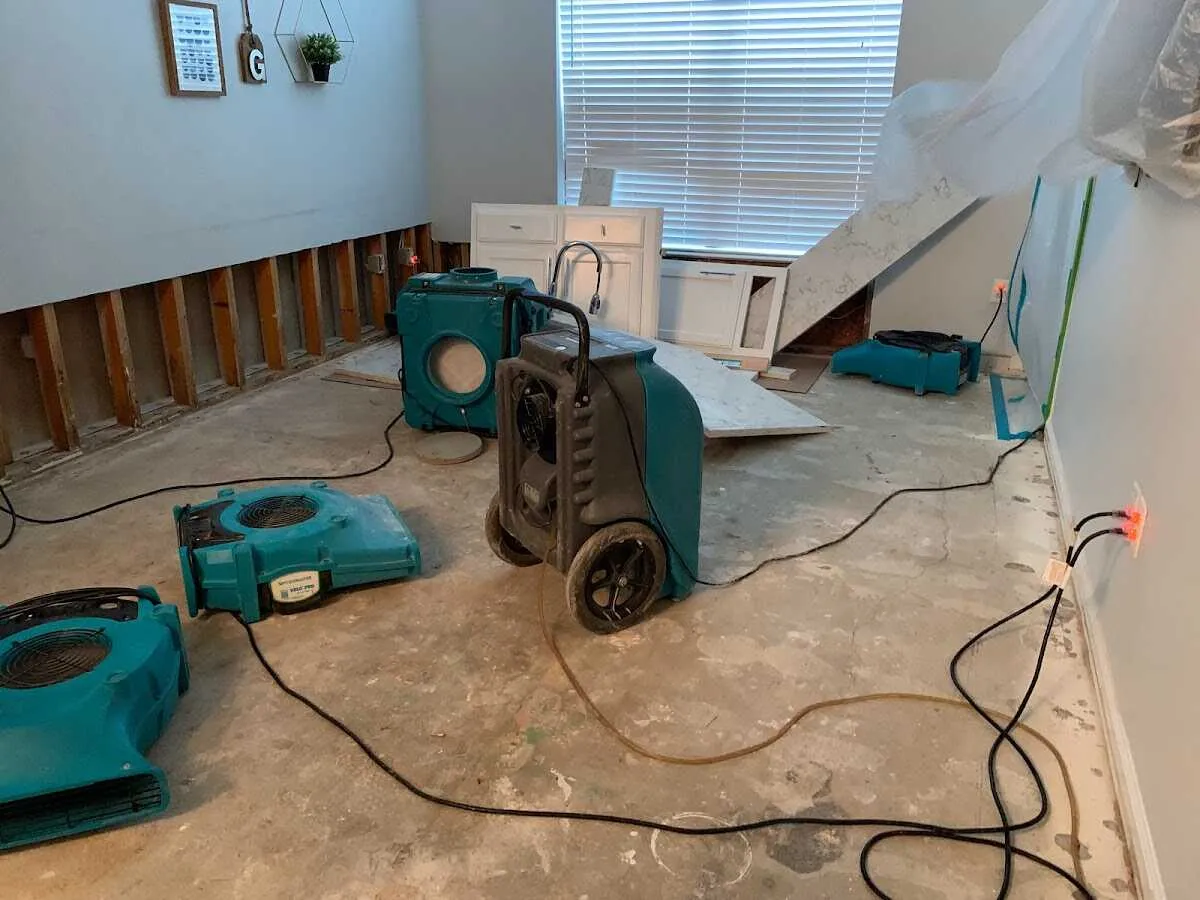 Dehumidifier in flood-cut room for Water Damage Restoration in Irvine